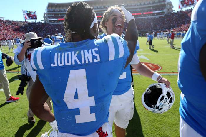 Nov 4, 2023; Oxford, Mississippi, USA; Mississippi Rebels running back Quinshon Judkins (4) and quarterback Jaxson Dart (2) react after defeating the Texas A&M Aggies at Vaught-Hemingway Stadium. (Petre Thomas / USA TODAY Sports).